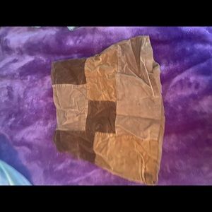 a checkered brown skirt